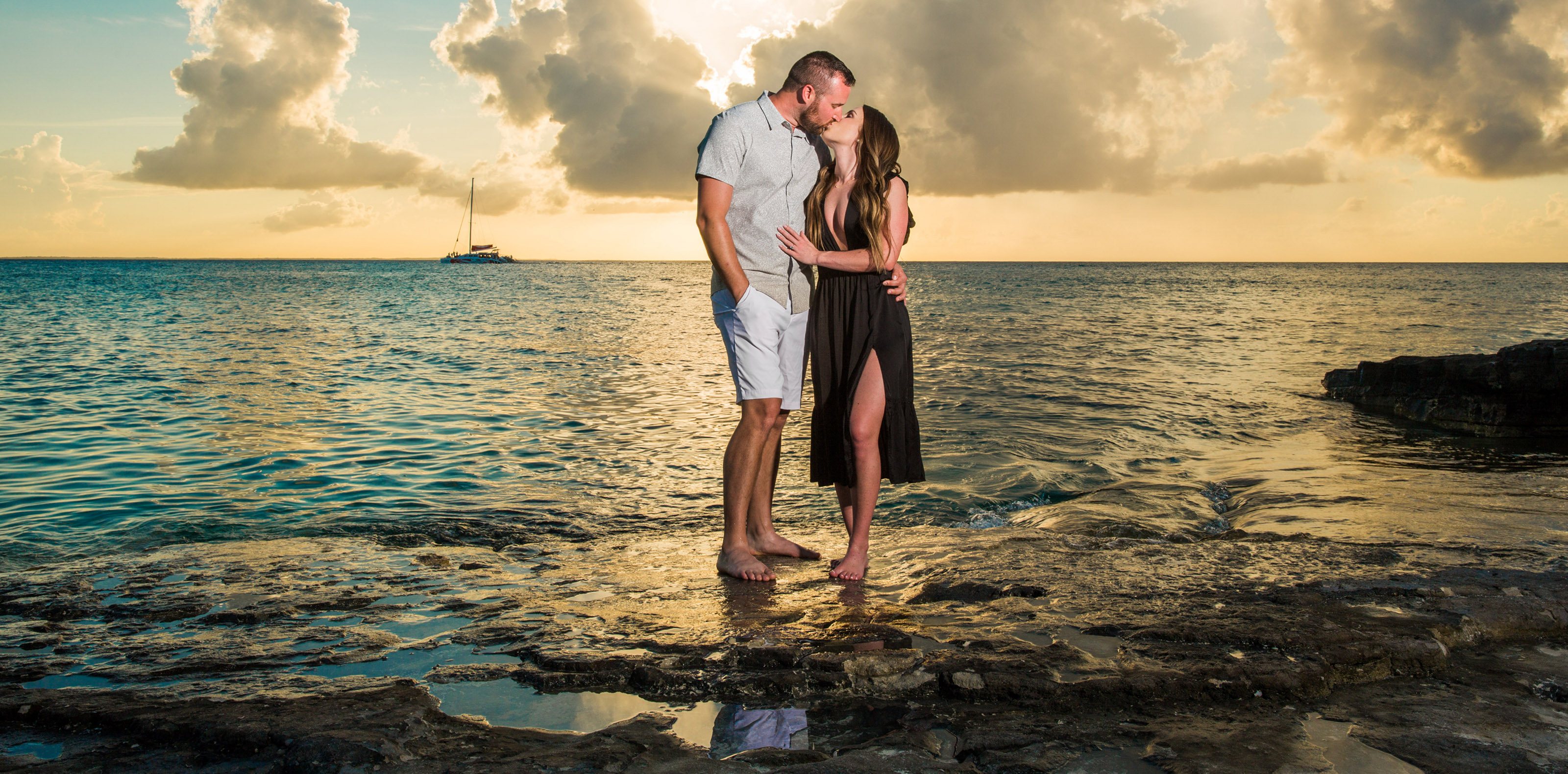 Couple at sunset on the rocks in Turks and Caicos
