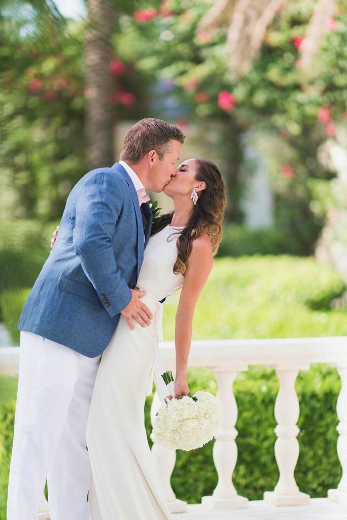 Bride and groom kissing after the ceremony