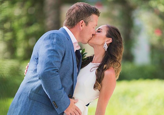 Bride and groom kissing