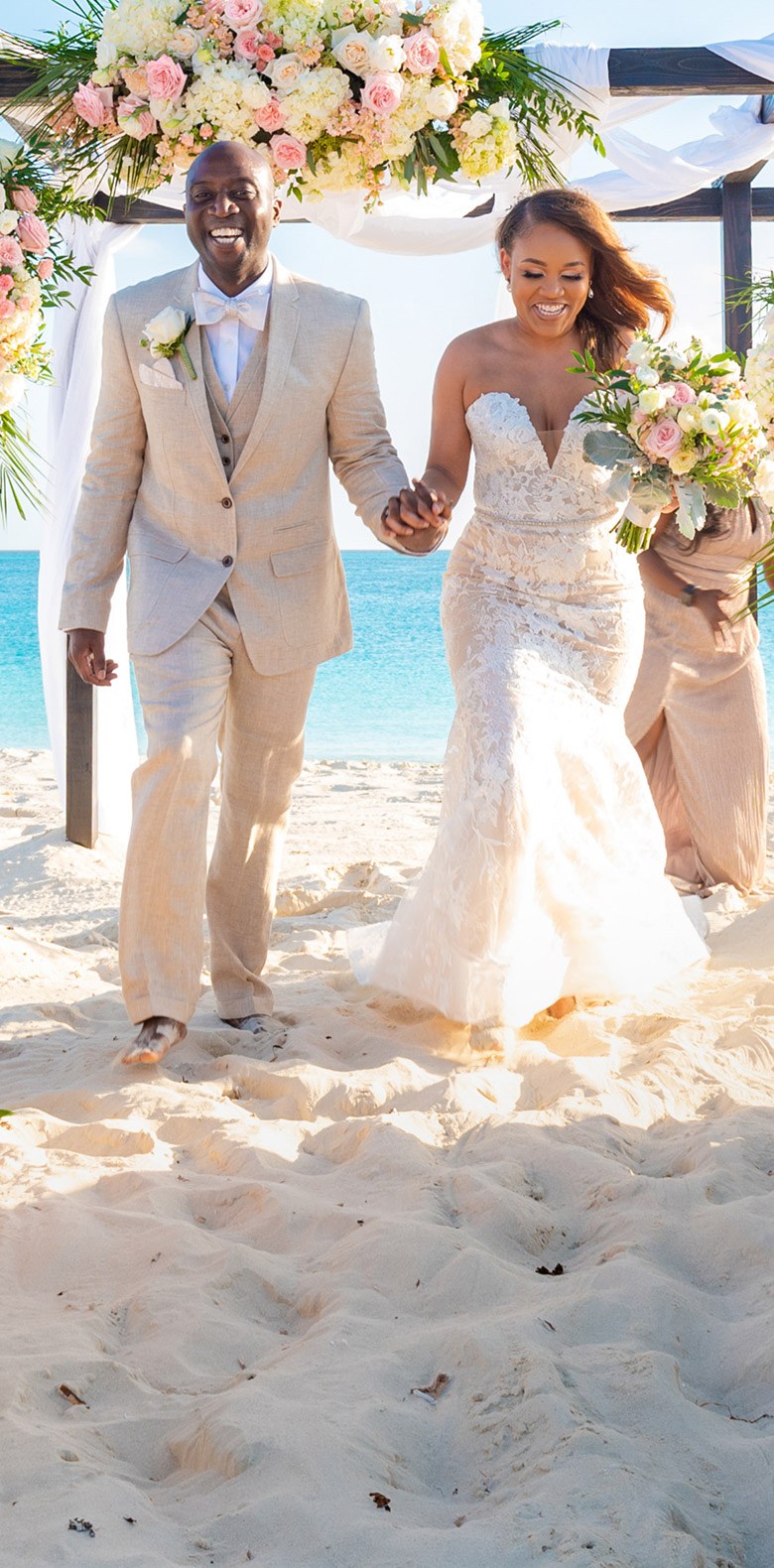 Bride and groom walking down the aisle